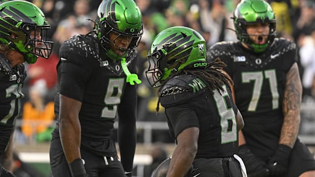 Телевізійна аудиторія Oregon Ducks USC Trojans College Football Велика десятка матчів наслідки плей-офф Washington Huskies 